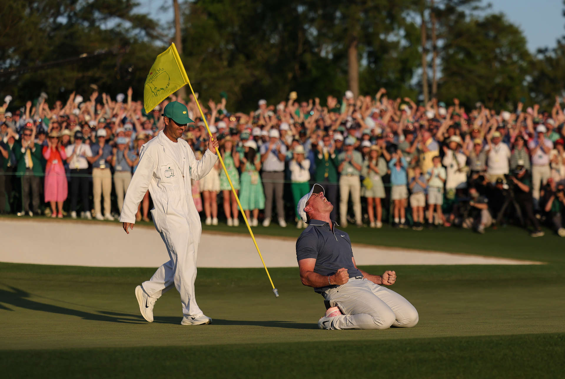 AUGUSTA, GEORGIA - APRIL 13: Rory McIlroy of Northern Ireland celebrates winning the 2025 Masters Tournament after the playoff hole on the 18th green at Augusta National Golf Club on April 13, 2025 in Augusta, Georgia. (Photo by Andrew Redington/Getty Images)