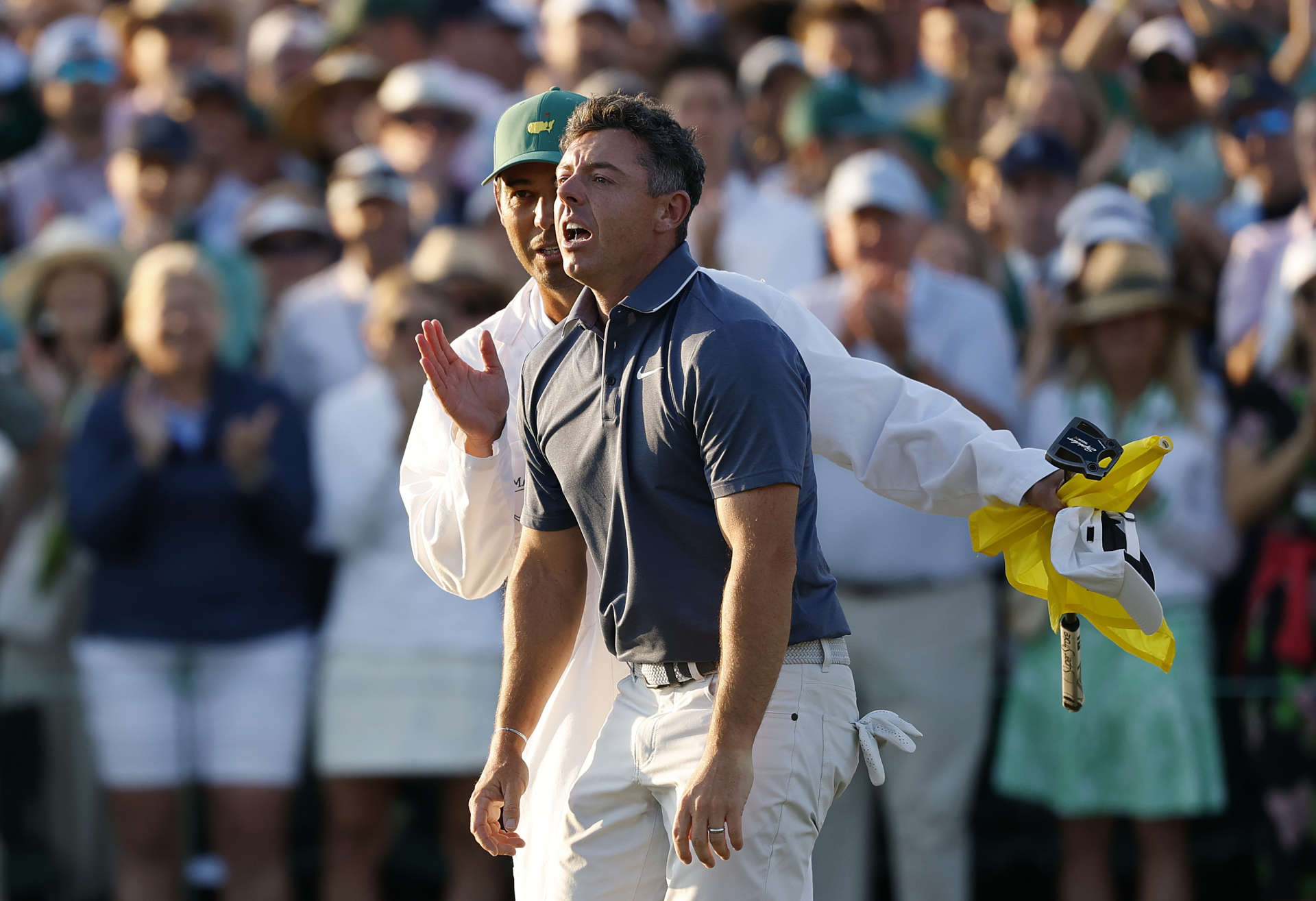 AUGUSTA, GEORGIA - APRIL 13: (R-L) Rory McIlroy of Northern Ireland celebrates with caddie Harry Diamond on the first playoff hole during the final round of the 2025 Masters Tournament at Augusta National Golf Club on April 13, 2025 in Augusta, Georgia. (Photo by Harry How/Getty Images)