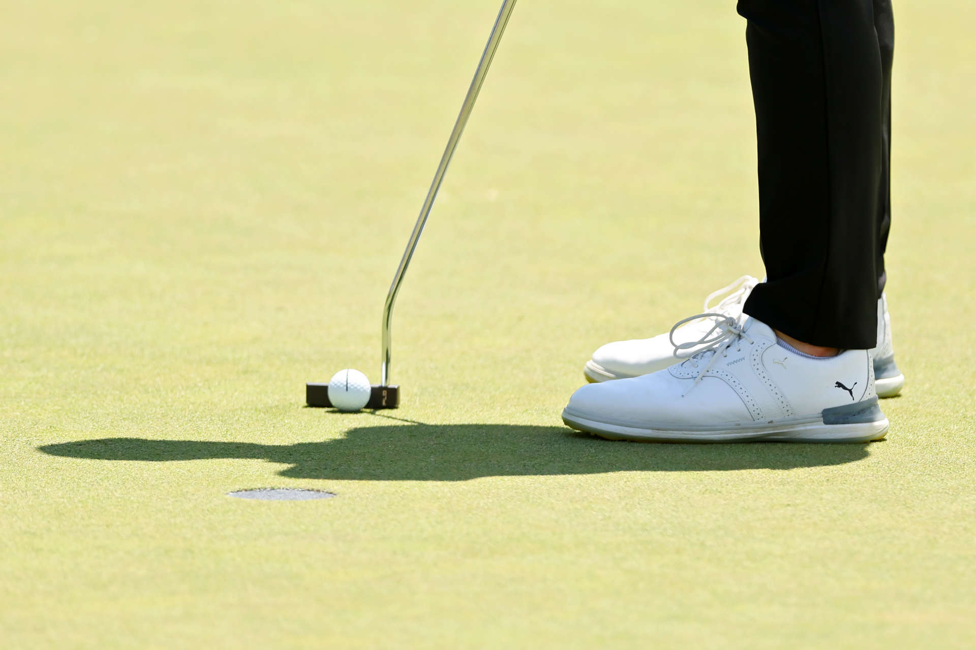 DUBLIN, OHIO - JUNE 09: A detail view of the Puma shoes worn by Viktor Hovland of Norway on the fourth green during the final round of the Memorial Tournament presented by Workday at Muirfield Village Golf Club on June 09, 2024 in Dublin, Ohio. (Photo by Michael Reaves/Getty Images)