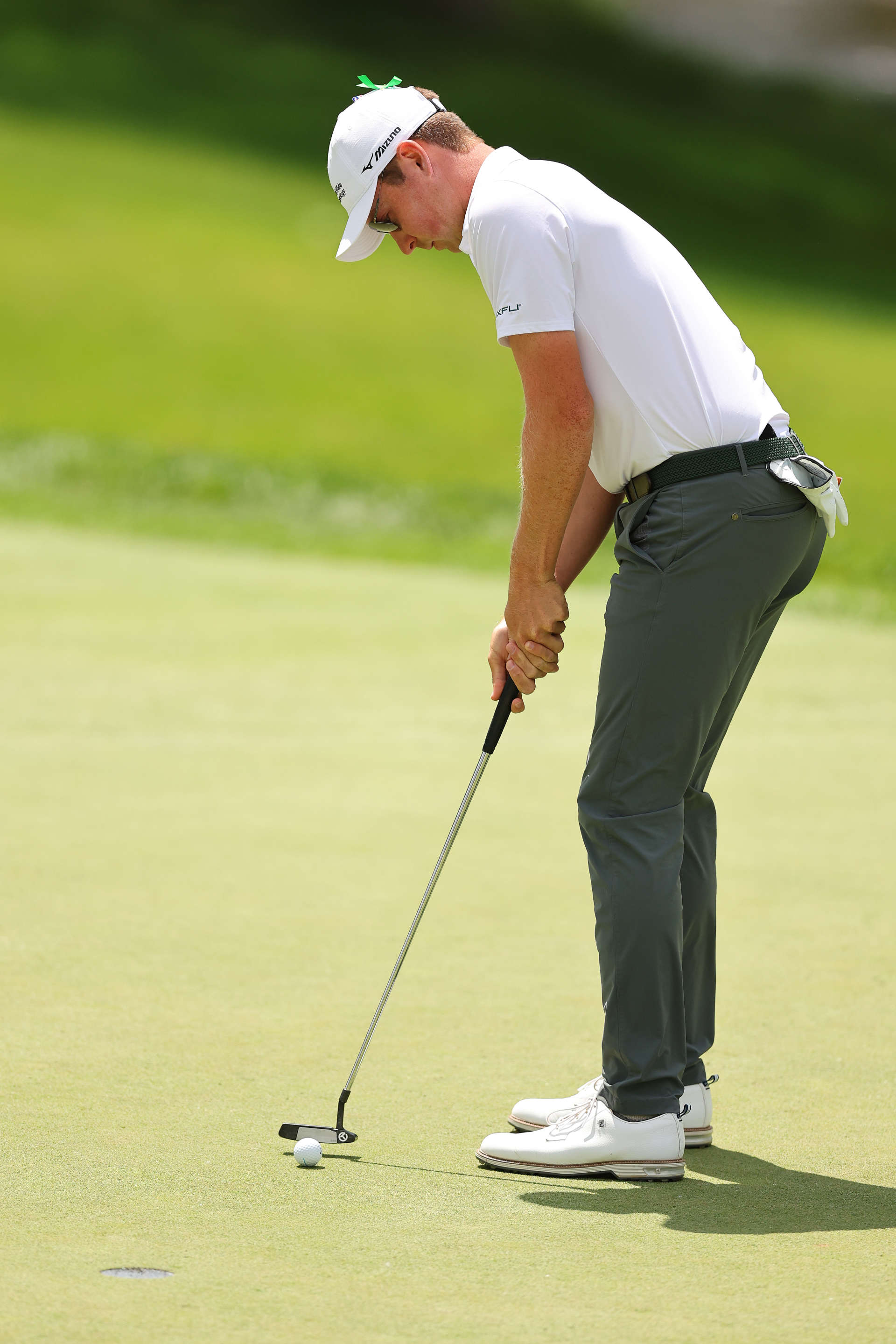 DUBLIN, OHIO - JUNE 07: Ben Griffin of the United States putts on the fourth green during the second round of the Memorial Tournament presented by Workday at Muirfield Village Golf Club on June 07, 2024 in Dublin, Ohio. (Photo by Michael Reaves/Getty Images)