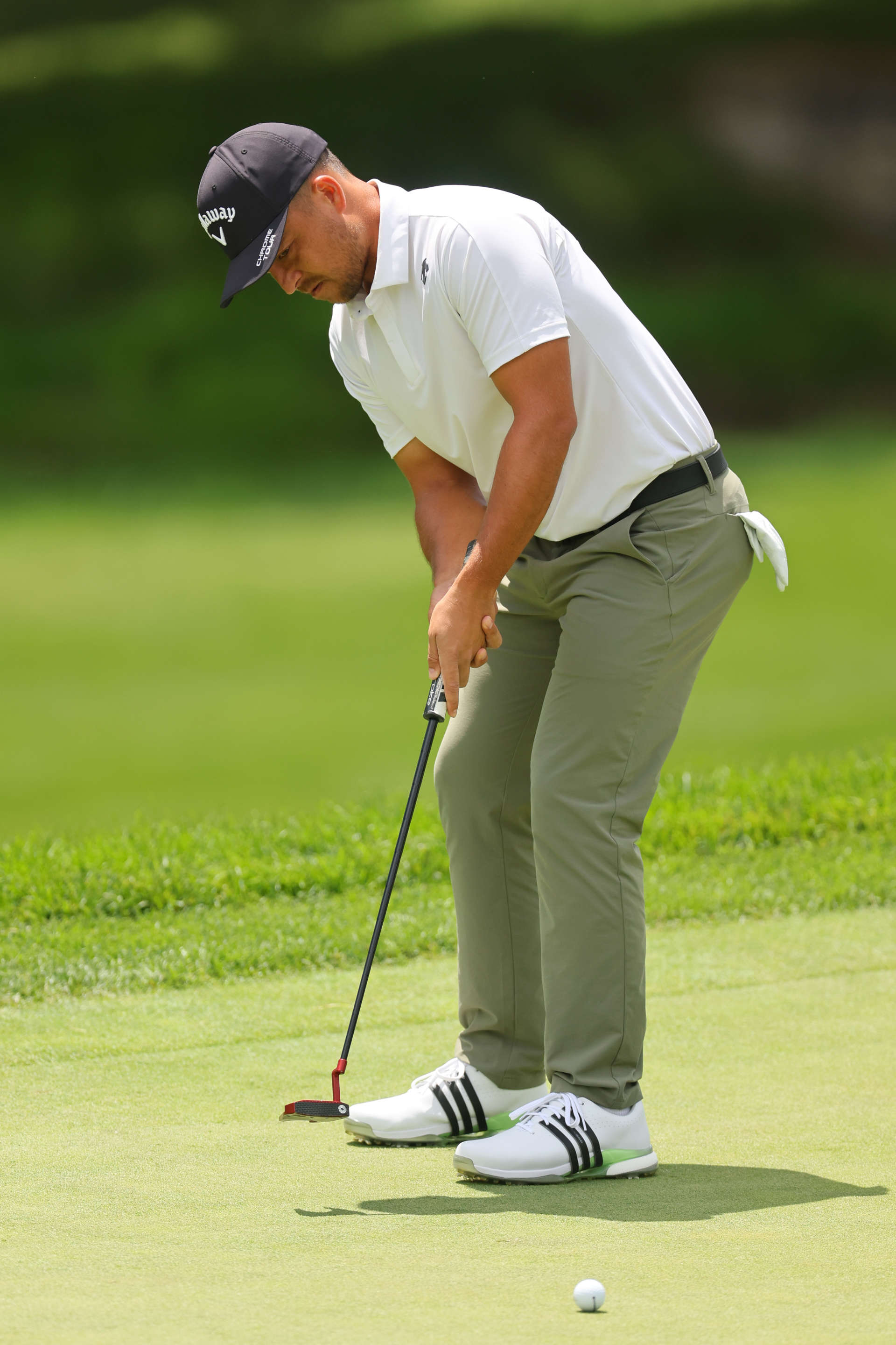 DUBLIN, OHIO - JUNE 07: Xander Schauffele of the United States putts on the fourth green during the second round of the Memorial Tournament presented by Workday at Muirfield Village Golf Club on June 07, 2024 in Dublin, Ohio. (Photo by Michael Reaves/Getty Images)