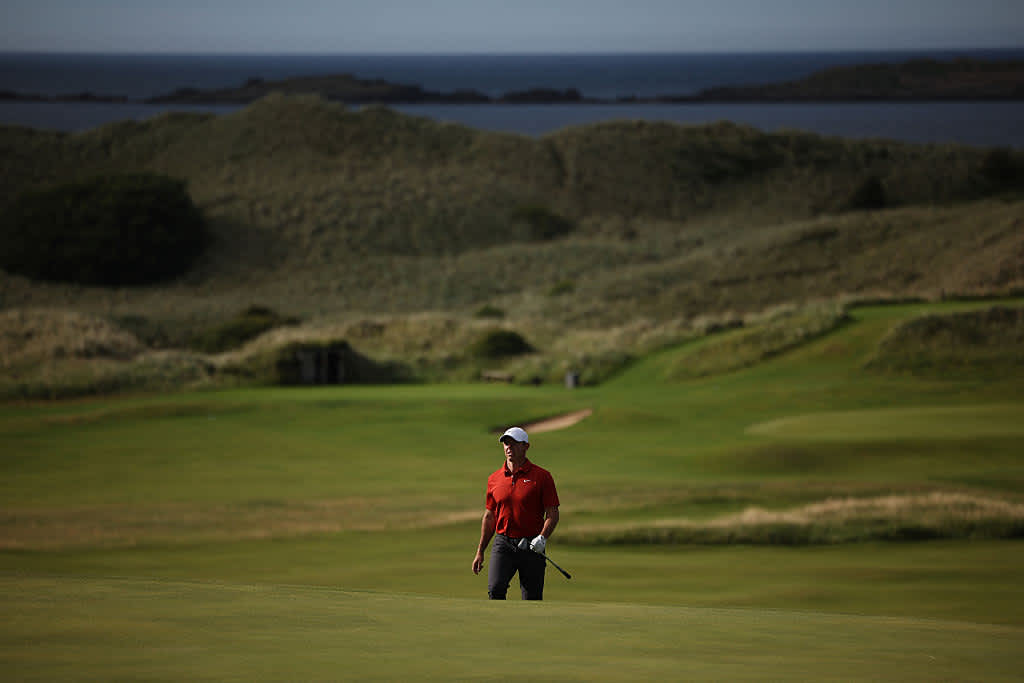 Northern Ireland's Rory McIlroy walks onto the 16th green on day three of the 153rd Open Championship at Royal Portrush golf club in Northern Ireland on July 19, 2025. (Photo by HENRY NICHOLLS / AFP) / RESTRICTED TO EDITORIAL USE (Photo by HENRY NICHOLLS/AFP via Getty Images)