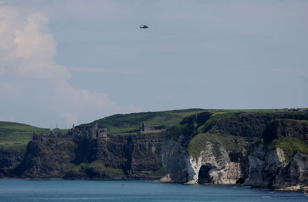 PORTRUSH, NORTHERN IRELAND - JULY 20: A helicopter flies over Dunluce Castle during day four of The 153rd Open Championship at Royal Portrush Golf Club on July 20, 2025 in Portrush, Northern Ireland. (Photo by Richard Heathcote/Getty Images)