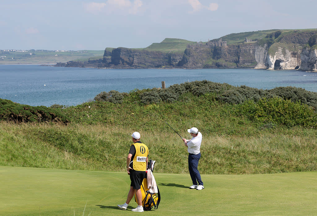 PORTRUSH, NORTHERN IRELAND - JULY 20: Robert MacIntyre of Scotland plays a shot on the fifth hole as Dunluce Castle is seen in the background during day four of The 153rd Open Championship at Royal Portrush Golf Club on July 20, 2025 in Portrush, Northern Ireland. (Photo by Christian Petersen/Getty Images)