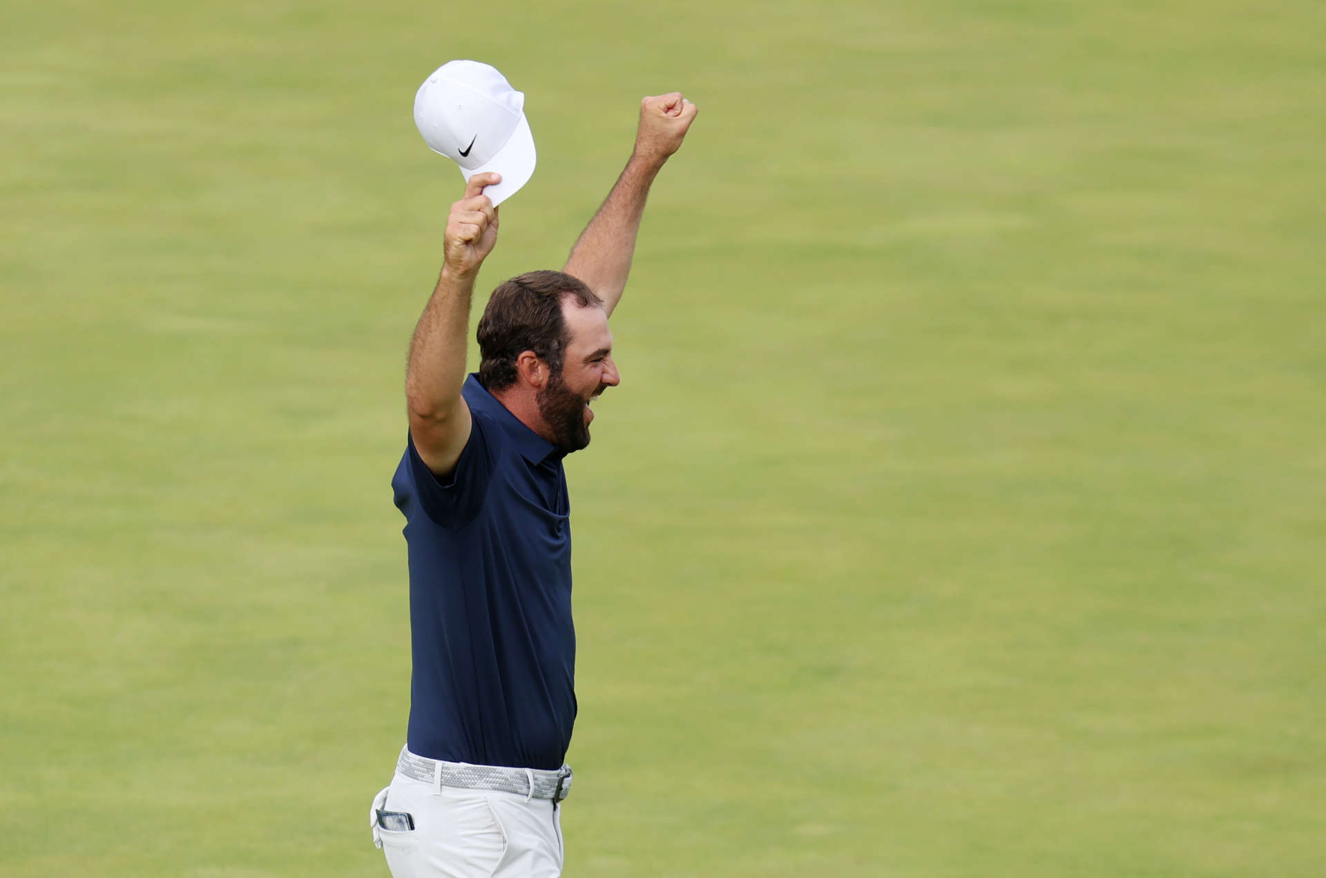 PORTRUSH, NORTHERN IRELAND - JULY 20: Scottie Scheffler of the United States celebrates on the 18th green after winning The 153rd Open Championship at Royal Portrush Golf Club on July 20, 2025 in Portrush, Northern Ireland. (Photo by Andrew Redington/Getty Images)