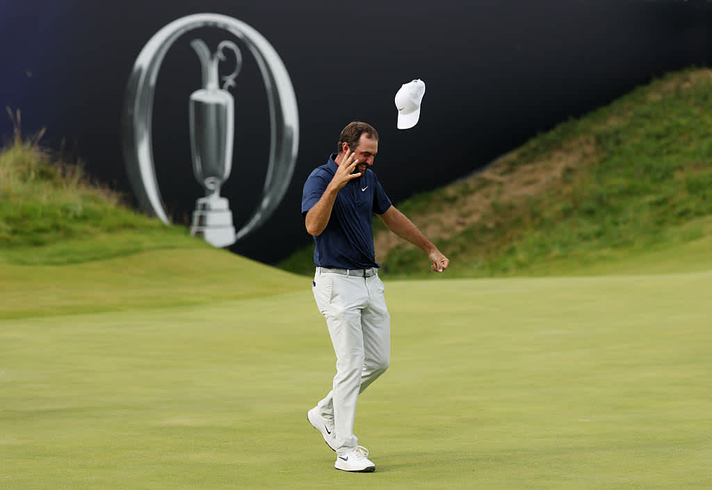PORTRUSH, NORTHERN IRELAND - JULY 20: Scottie Scheffler of the United States celebrates on the 18th green after winning The 153rd Open Championship at Royal Portrush Golf Club on July 20, 2025 in Portrush, Northern Ireland. (Photo by Richard Heathcote/Getty Images)