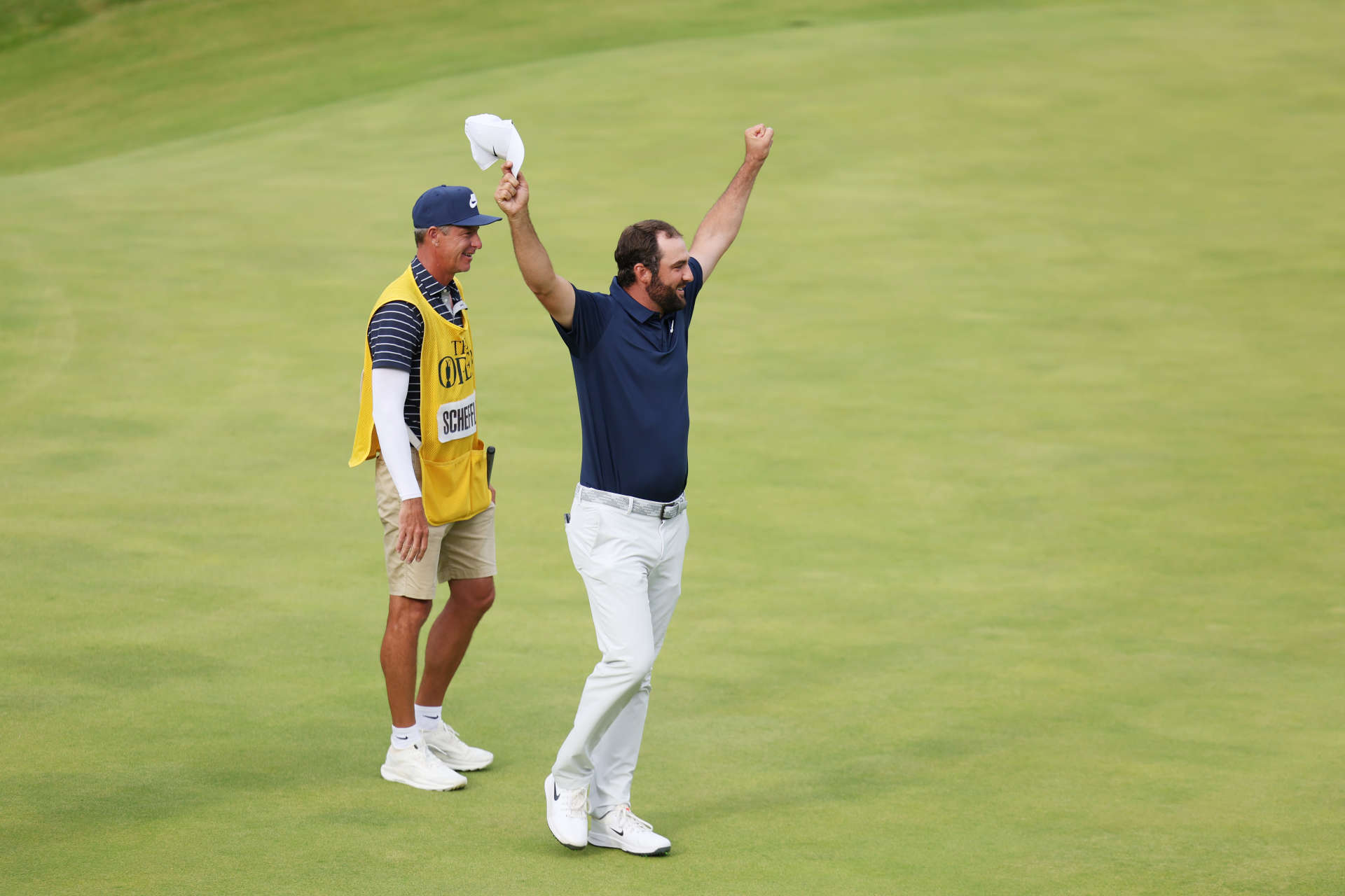PORTRUSH, NORTHERN IRELAND - JULY 20: Scottie Scheffler of the United States celebrates on the 18th green after winning The 153rd Open Championship at Royal Portrush Golf Club on July 20, 2025 in Portrush, Northern Ireland. (Photo by Andrew Redington/Getty Images)