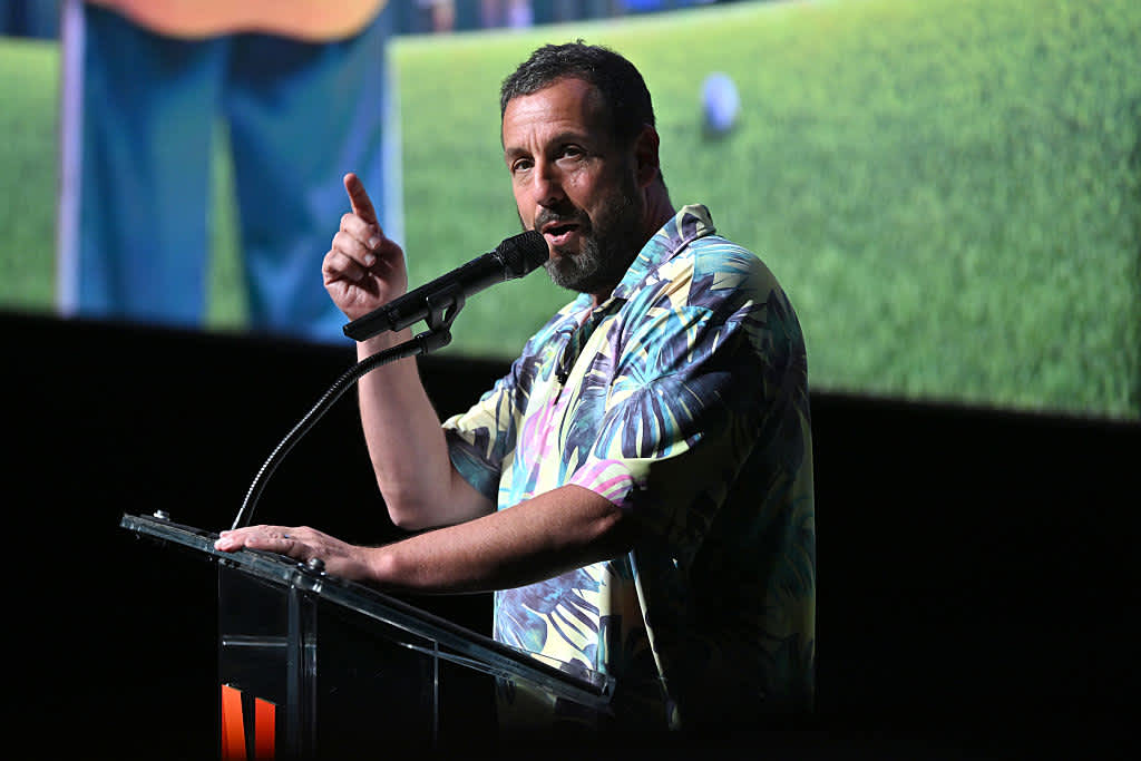 NEW YORK, NEW YORK - JULY 21: Adam Sandler speaks onstage during the Happy Gilmore 2 World Premiere at Jazz at Lincoln Center on July 21, 2025 in New York City. (Photo by Roy Rochlin/Getty Images for Netflix)