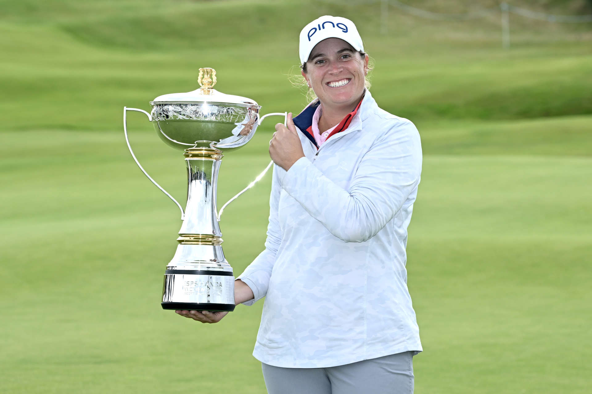 TROON, SCOTLAND - AUGUST 18: Lauren Coughlin of United States pose for a photo with the trophy after winning the ISPS HANDA Women's Scottish Open on the 18th green during the final round of the ISPS HANDA Women's Scottish Open at Dundonald Links Golf Course on August 18, 2024 in Troon, Scotland. (Photo by Paul Devlin/Getty Images)