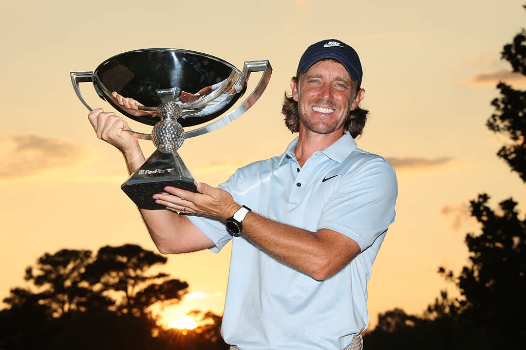 ATLANTA, GEORGIA - AUGUST 24: Tommy Fleetwood of England poses with the Fedex Cup trophy after winning the final round of the TOUR Championship 2025 at East Lake Golf Club on August 24, 2025 in Atlanta, Georgia. (Photo by Kevin C. Cox/Getty Images)