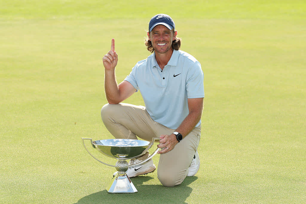ATLANTA, GEORGIA - AUGUST 24: Tommy Fleetwood of England poses with the Fedex Cup trophy after winning the final round of the TOUR Championship 2025 at East Lake Golf Club on August 24, 2025 in Atlanta, Georgia. (Photo by Kevin C. Cox/Getty Images)
