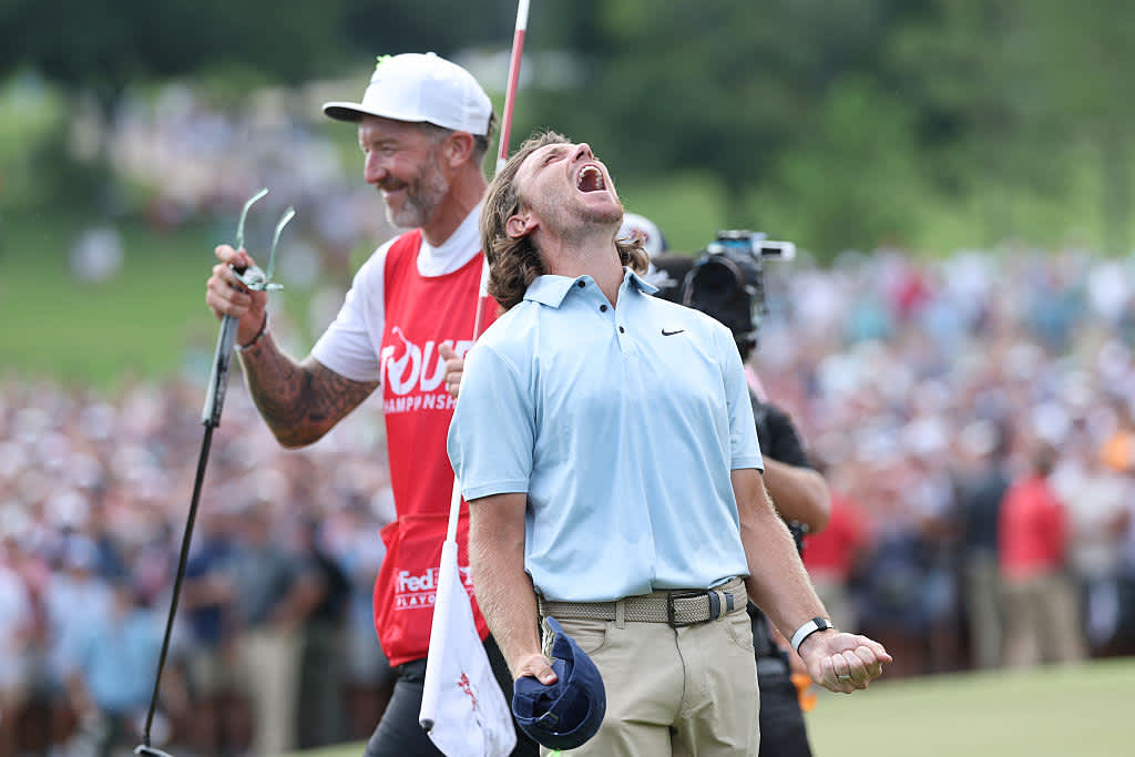 ATLANTA, GEORGIA - AUGUST 24: Tommy Fleetwood of England celebrates on the 18th green after winning the final round of the TOUR Championship 2025 at East Lake Golf Club on August 24, 2025 in Atlanta, Georgia. (Photo by Kevin C. Cox/Getty Images)