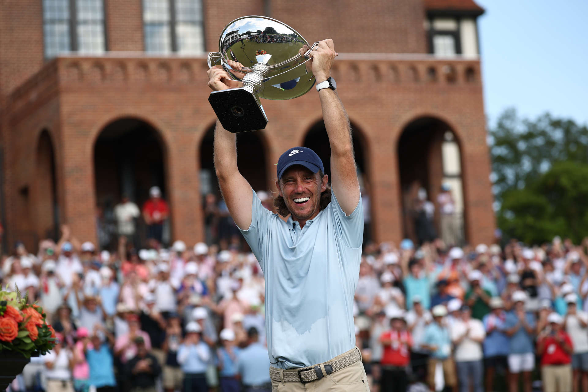ATLANTA, GEORGIA - AUGUST 24: Tommy Fleetwood of England celebrates with the Fedex Cup trophy after winning the final round of the TOUR Championship 2025 at East Lake Golf Club on August 24, 2025 in Atlanta, Georgia. (Photo by Jared C. Tilton/Getty Images)