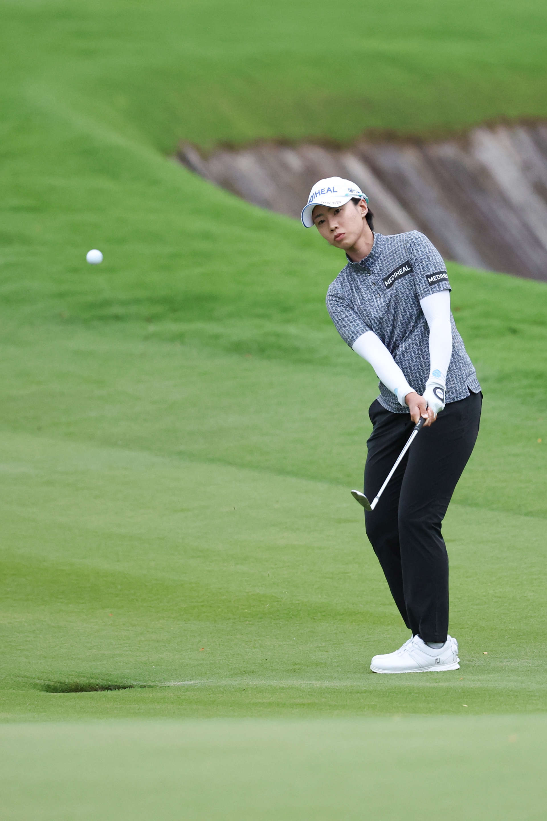 HAINAN ISLAND, CHINA - MARCH 08: Narin An of Republic of Korea plays her shot on the 9th hole during the second round of the Blue Bay LPGA at Jian Lake Blue Bay Golf Course on March 08, 2024 in Hainan Island, Hainan. (Photo by Zhizhao Wu/Getty Images)