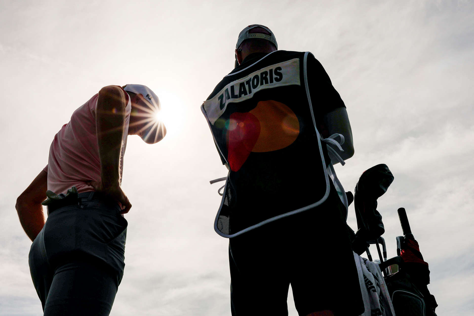 ORLANDO, FLORIDA - MARCH 10: Will Zalatoris of the United States talks with his caddie Joel Stock after hitting a tee shot on the 12th hole during the final round of the Arnold Palmer Invitational presented by Mastercard at Arnold Palmer Bay Hill Golf Course on March 10, 2024 in Orlando, Florida. (Photo by Brennan Asplen/Getty Images)