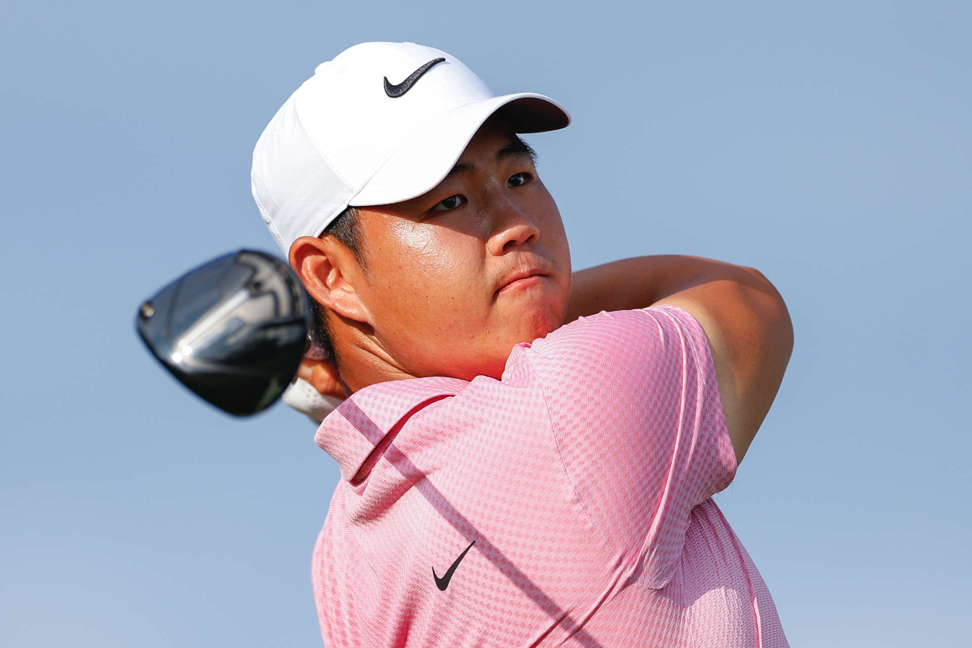 ORLANDO, FLORIDA - MARCH 08: Tom Kim of South Korea hits a tee shot on the 15th hole during the second round of the Arnold Palmer Invitational presented by Mastercard at Arnold Palmer Bay Hill Golf Course on March 08, 2024 in Orlando, Florida. (Photo by Mike Ehrmann/Getty Images)
