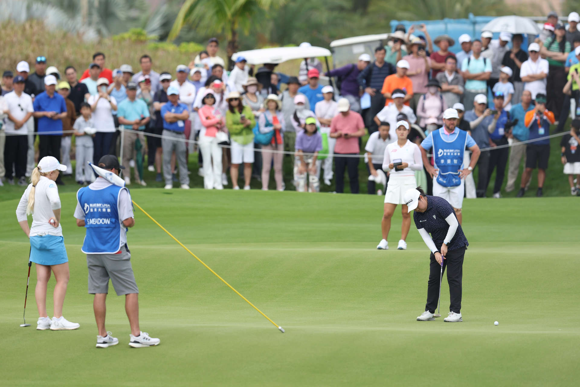 HAINAN ISLAND, CHINA - MARCH 09: Ruixin Liu of China putts on 18th green during the third round of the Blue Bay LPGA at Jian Lake Blue Bay Golf Course on March 09, 2024 in Hainan Island, Hainan. (Photo by Zhizhao Wu/Getty Images)