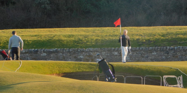 Golfers playing