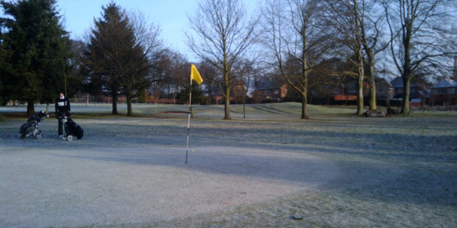 Golfers Playing Winter Golf