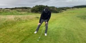 How To Play a Downhill Lie Chip Shot