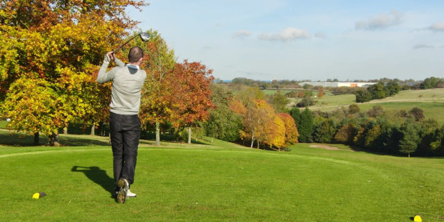 Golfer in Aumtumn Getting it Right