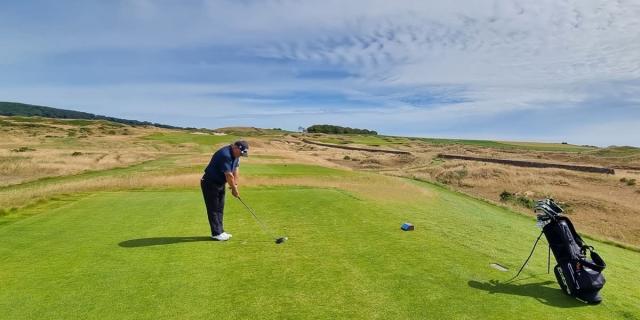 Golfers playing golf