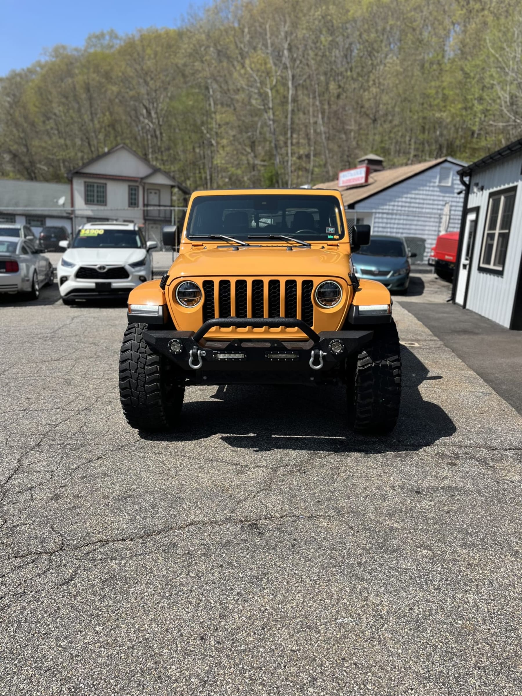 NEW ARRIVAL!! 2021 Jeep Gladiator Sport S!! Only 35,400 miles! One Owner Clean Carfax! This is a special order vehicle right from Jeep! Some key options include cold weather group, LED lighting package, 8.4 inch radio and premium auto group, active safety group, adaptive cruise control, auxiliary switch group, hardtop headliner, cold air intake system by Mopar, black stitched leather upgrade by Mopar, remote start and much much much  more! Had a window sticker of $58,390! Add a lift, wheels and tires, front and back bumpers and more it’s a steal at only $41,900!!!