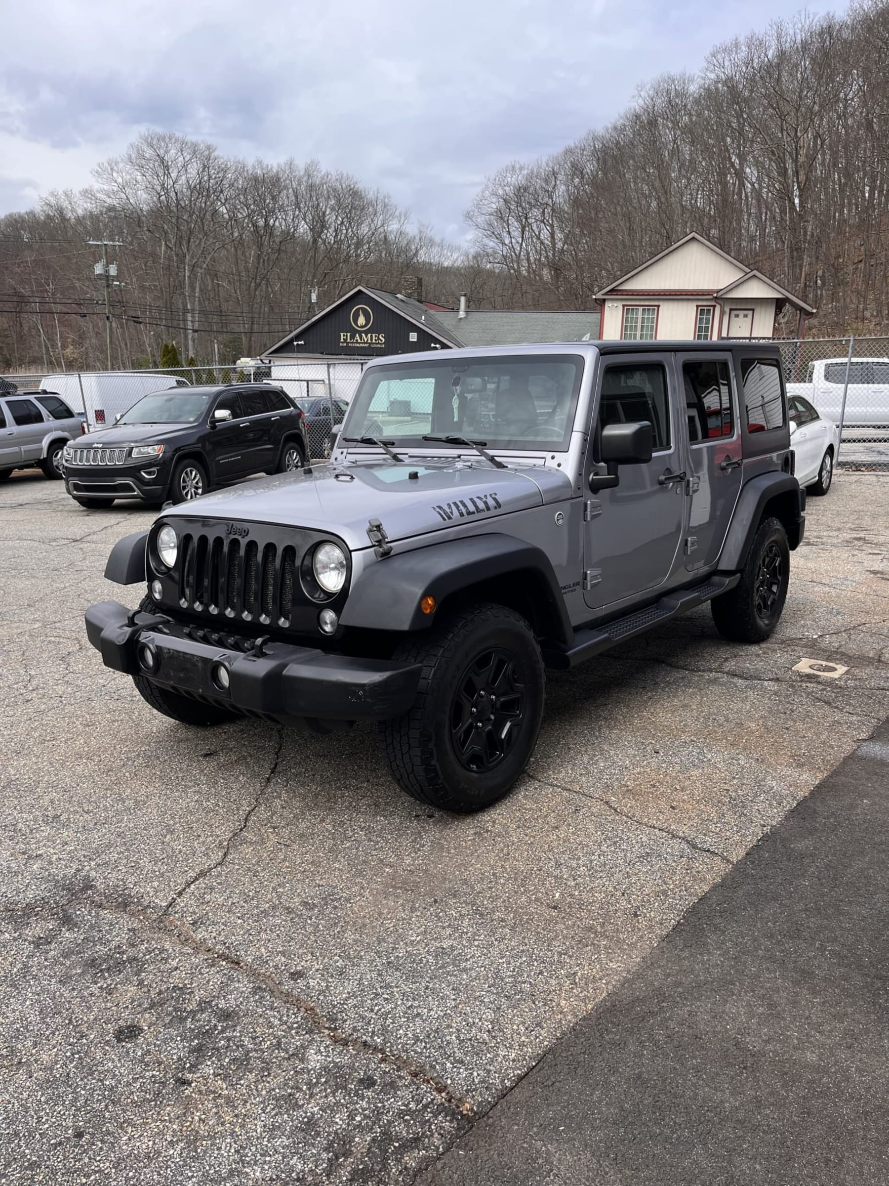 NEW ARRIVAL!!! 2016 Jeep Unlimited Willys Wheeler! Extremely clean! Clean carfax! 6 speed manual transmission! Power windows, power locks, Bluetooth, factory upgraded alpine stereo and much more! All highway miles! Runs and drives great! 145k miles! Won’t last at $16,900!!