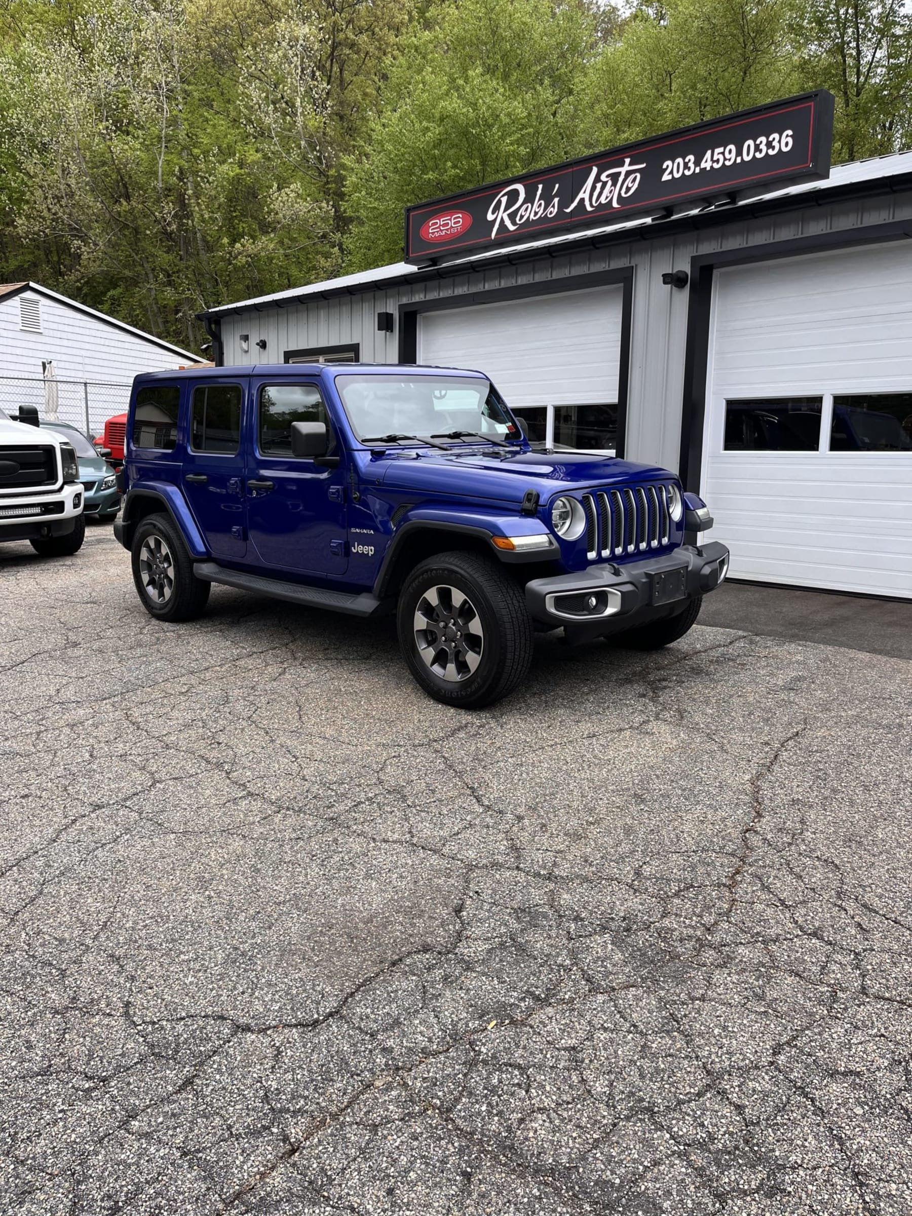 NEW ARRIVAL!! 2018 Jeep Unlimited Sahara!! Clean carfax! 78,700 miles! With an original window sticker of $52,300 this Jeep is LOADED! Heated Leather Seats, Heated Steering Wheel, Navigation, Backup Camera, Remote Start, Keyless Entry, Body Color Freedom Hardtop, Soft Top, Jeep Active Safety Group, LED Lighting Group, Alpine Premium Audio System and more!! It’s a steal at only $28,900!!