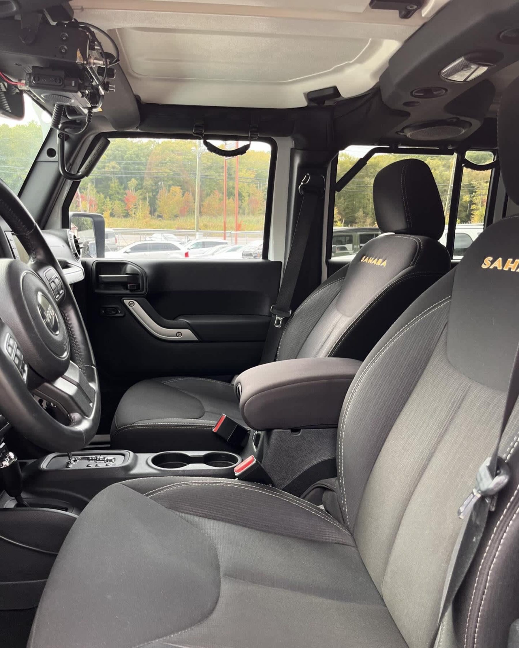 NEW ARRIVAL!! 2014 JEEP WRANGLER UNLIMITED SAHARA!! Just under 33k miles!! Clean carfax!! Remote start, navigation and a TON OF EXTRAS!! If you’re looking for low mileage, value and mods this is the jeep for you!! Save thousands!! Won’t last at ONLY $28,900!!