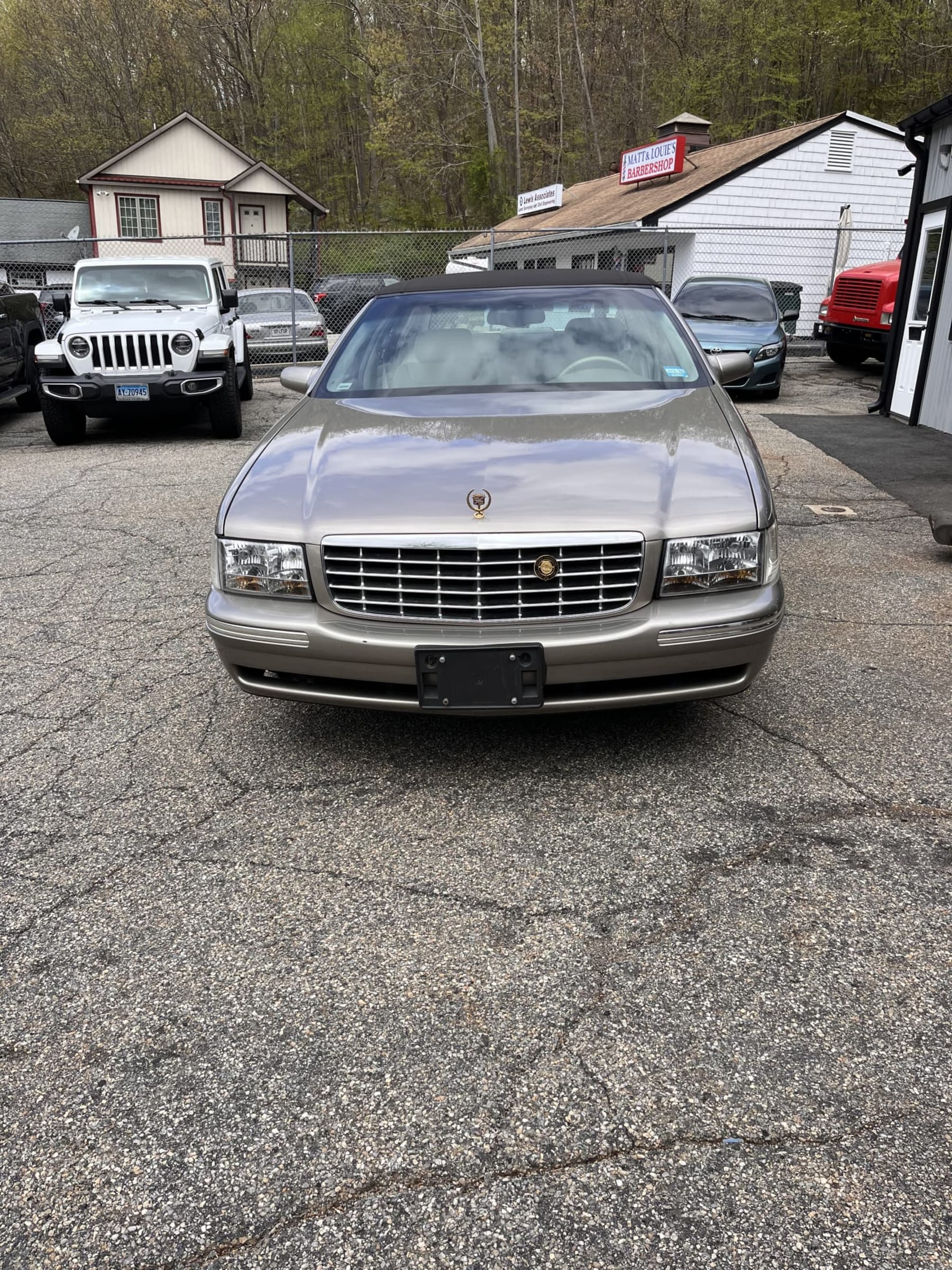 NEW ARRIVAL!! Looking for a diamond in the rough? Just in a 1999 Cadillac DeVille! 50 year golden anniversary edition!! ONLY 29,500 miles! Garaged its entire life! Runs and drives great!! Won’t last at $9,900!!