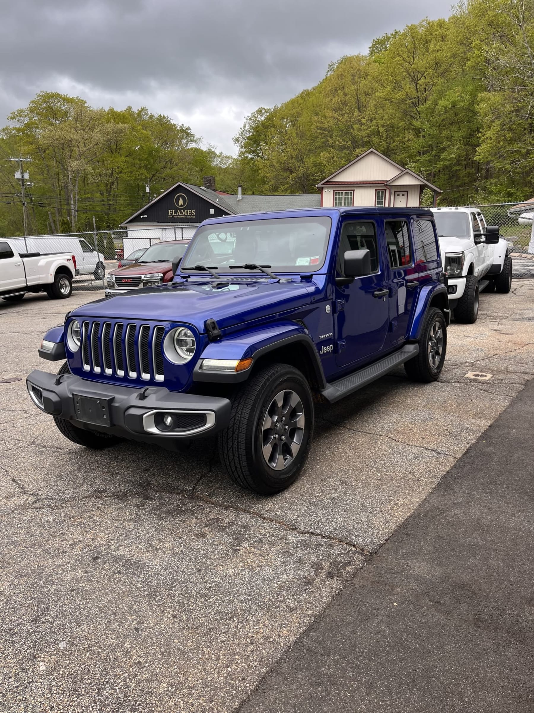 NEW ARRIVAL!! 2018 Jeep Unlimited Sahara!! Clean carfax! 78,700 miles! With an original window sticker of $52,300 this Jeep is LOADED! Heated Leather Seats, Heated Steering Wheel, Navigation, Backup Camera, Remote Start, Keyless Entry, Body Color Freedom Hardtop, Soft Top, Jeep Active Safety Group, LED Lighting Group, Alpine Premium Audio System and more!! It’s a steal at only $28,900!!