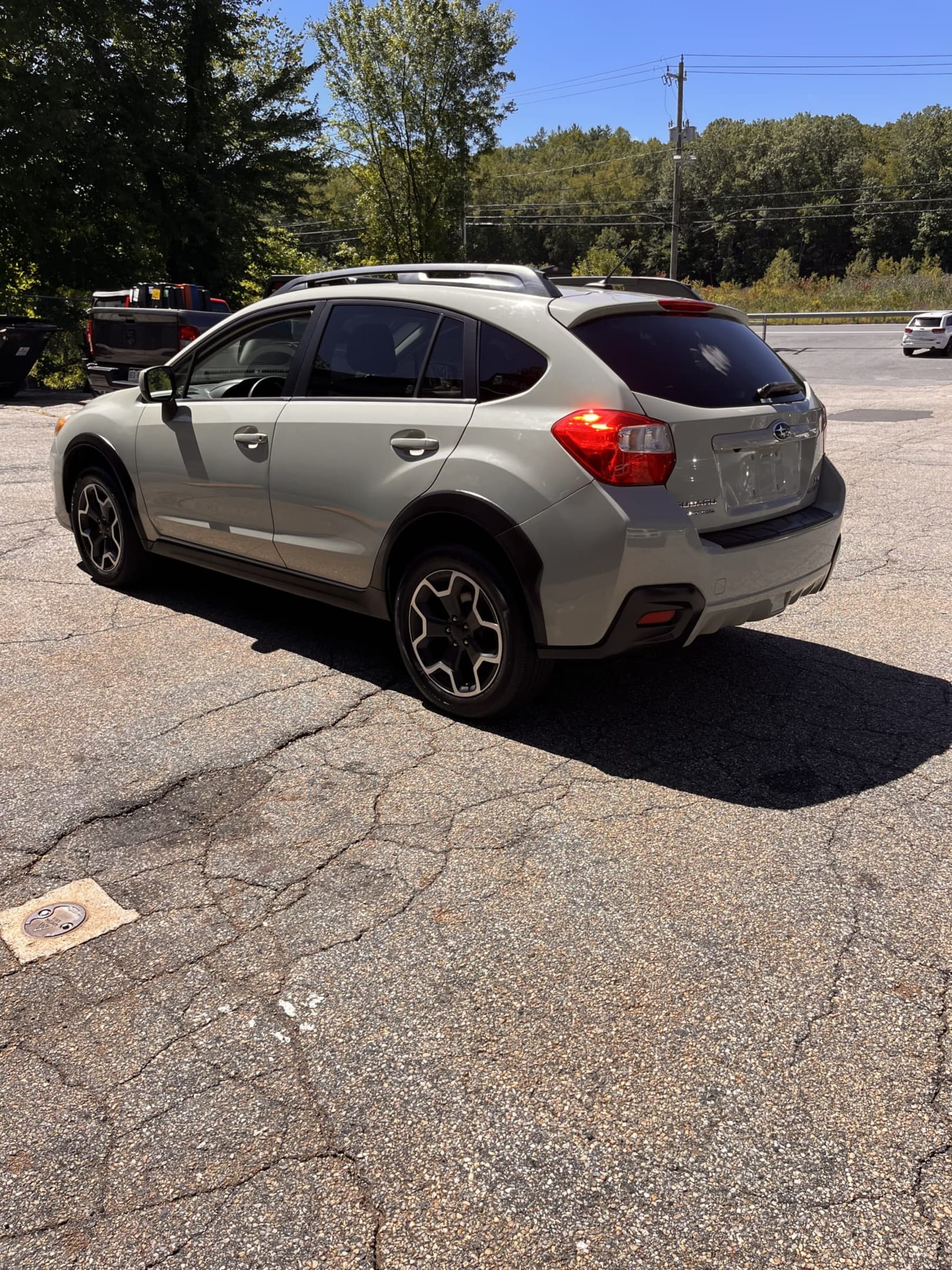 NEW ARRIVAL!!! 2013 Subaru XV Crosstrek 2.0i Premium!! This is one owner car with a perfect carfax!! AWD!! Heated seat! Backup camera! Bluetooth and more! Only 90,723 miles!! Perfect first car or commuter!! Won’t last at $9,900!!