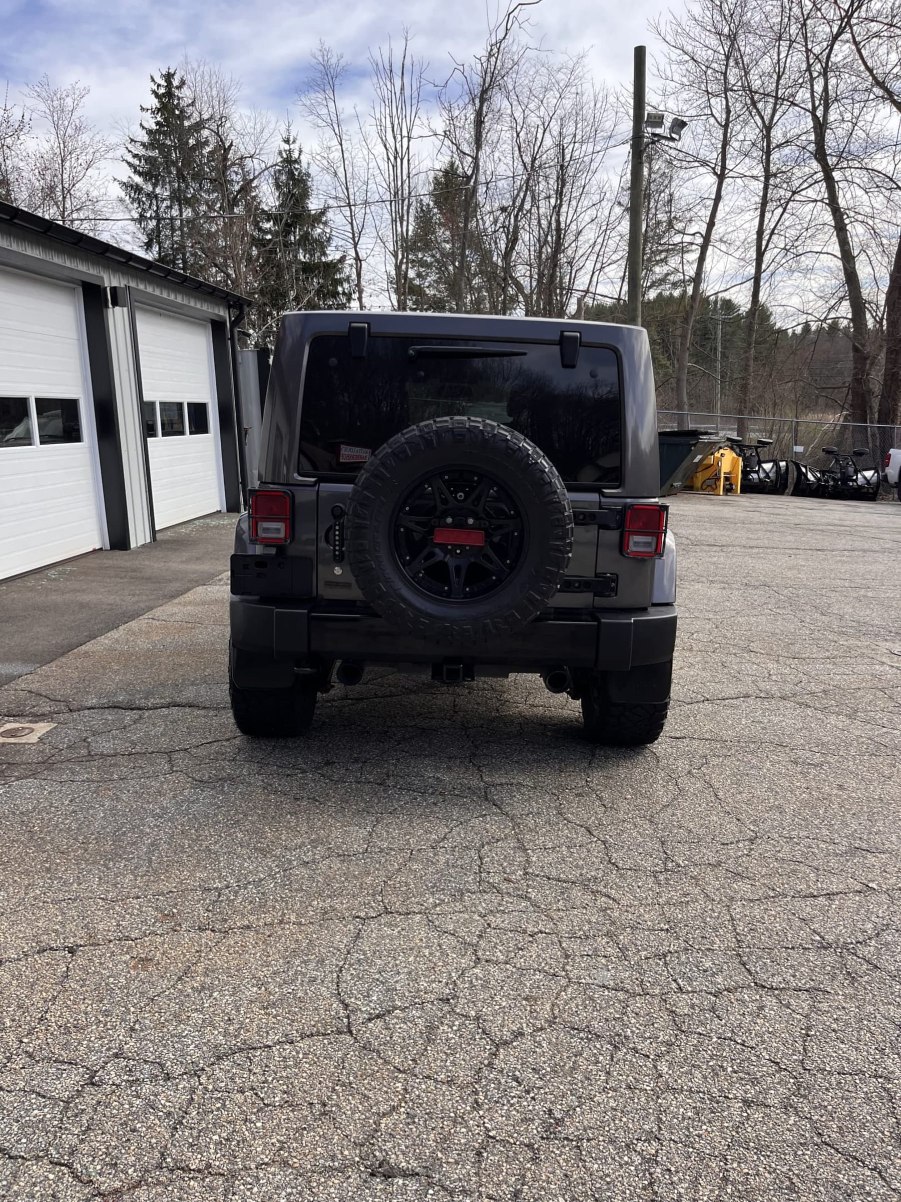 NEW ARRIVAL!! 2018 Jeep Unlimited Altitude!! Clean car fax! ONLY 43,800 miles!! Heated leather seats, lift, wheels and tires, backup camera, body color matching hard top, remote start and many extras!! Looks and runs great! Won’t last at $29,900!!