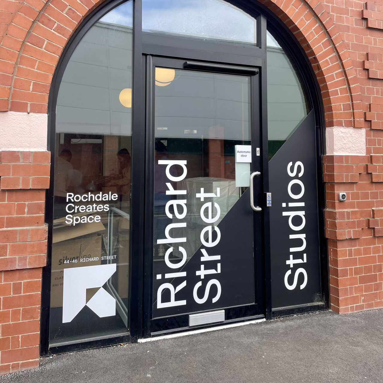 Branded window graphic design for Richard Street Studios