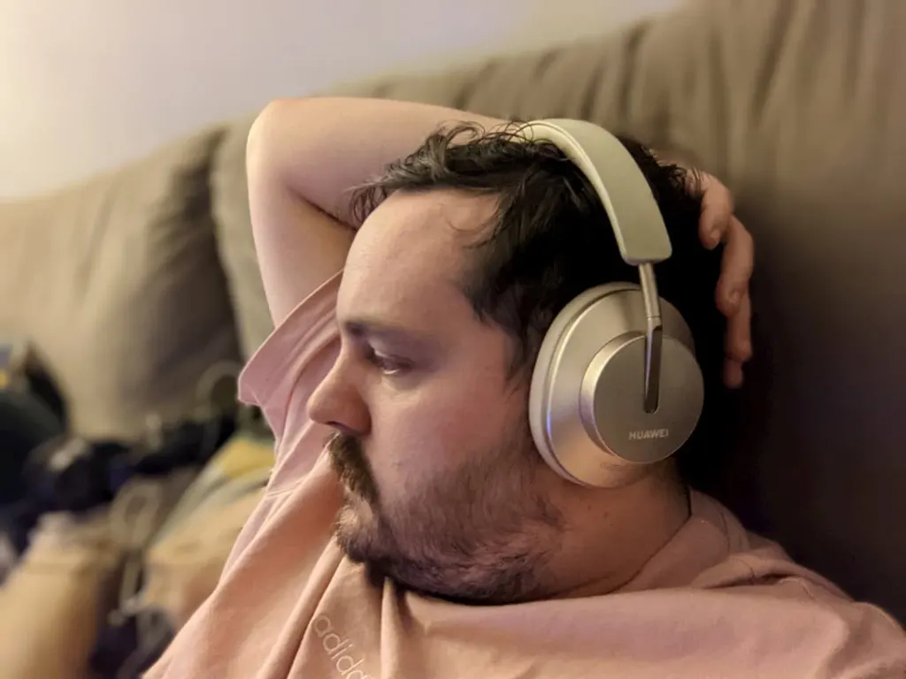 Gold Huawei headphones