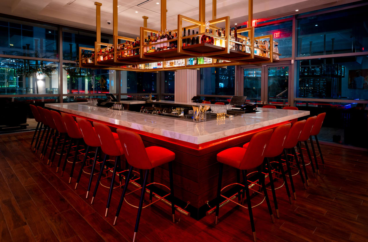 Black Jacket, Hell's Hideaway, Bar and Patio at Hell's Kitchen Miami