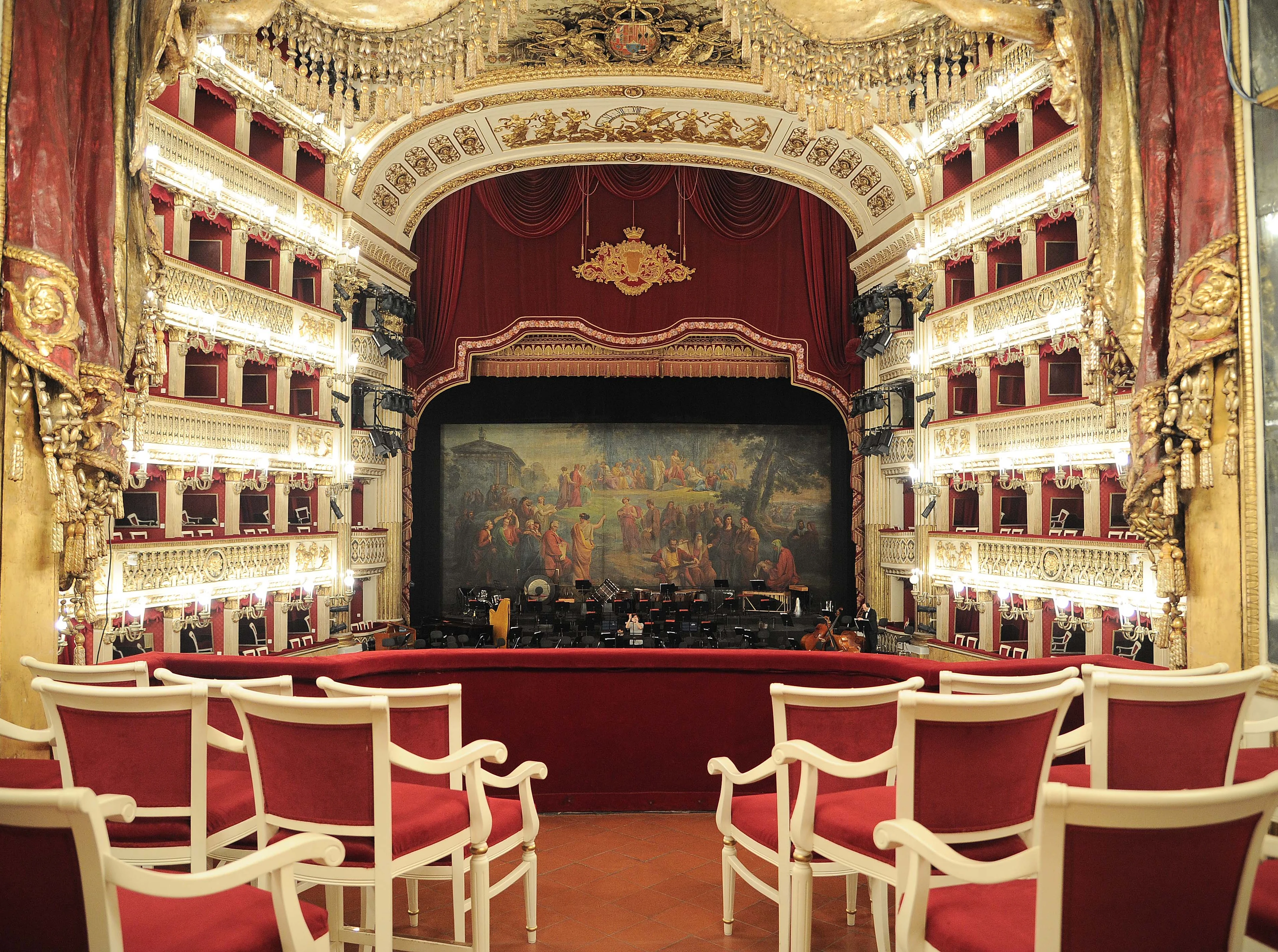 Theatre with Red Chairs and Galleries Overlooking a Stage