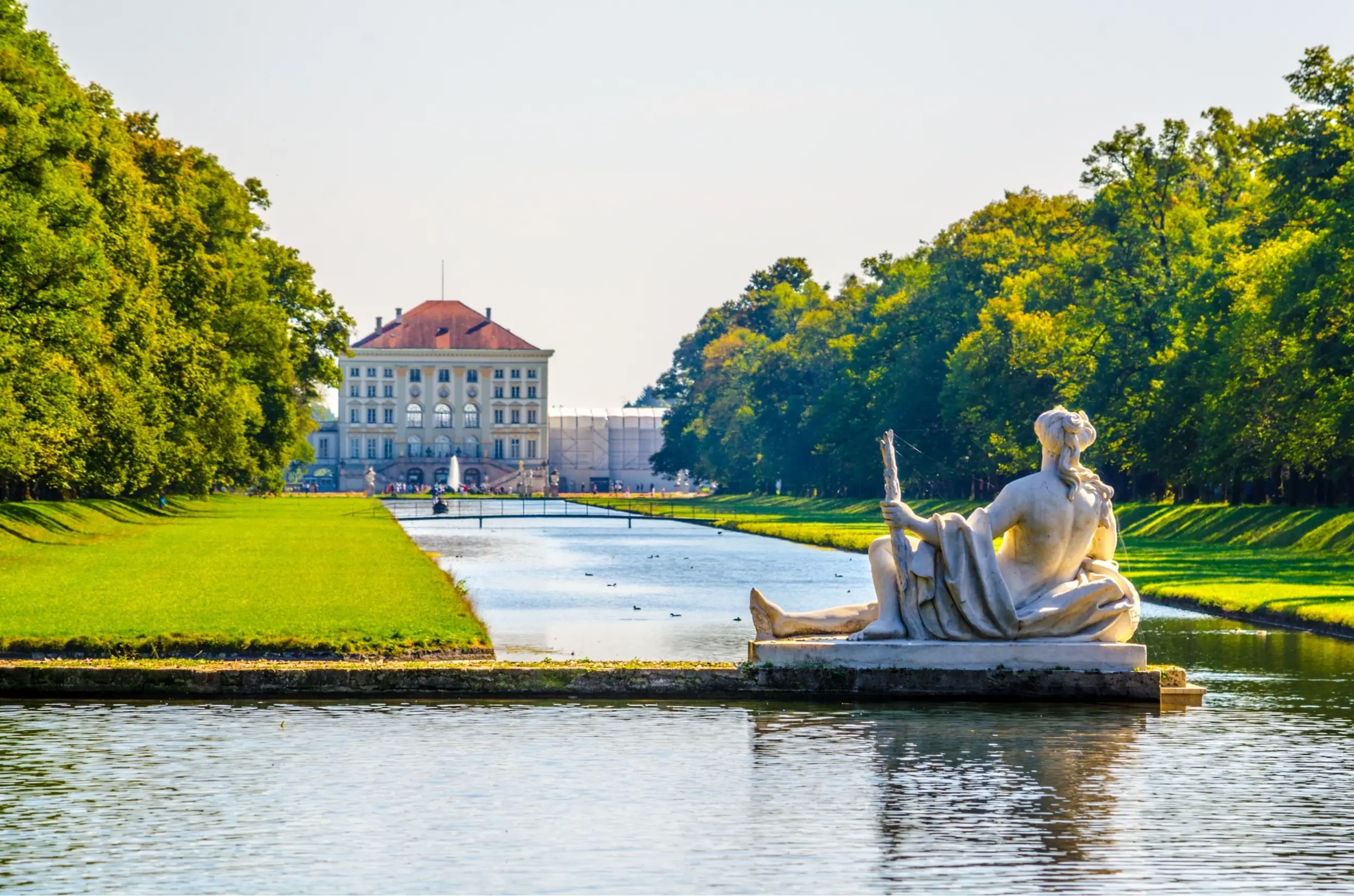 A Stone Statue in a Formal Lake  