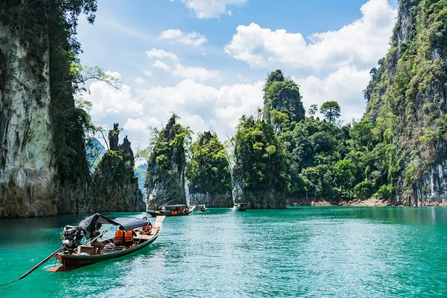 A Longtail Boat Sits on the Water in the Koh Samui Island Archipeligo