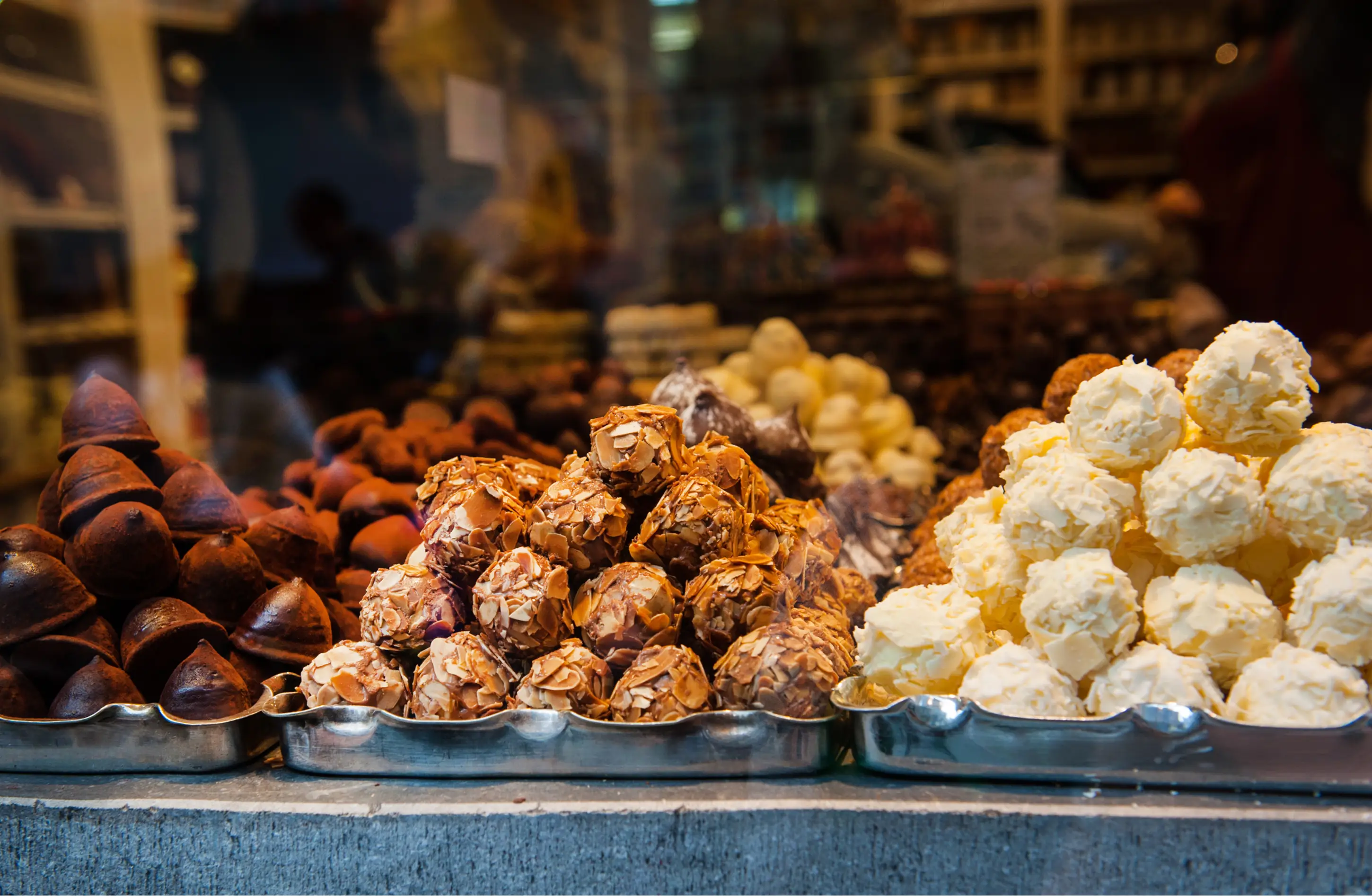 Piles of Chocolate Bonbons in the Window of a Belgian Chocolate Shop