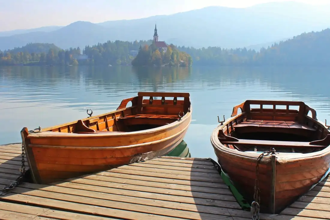 boats docked at lake bled