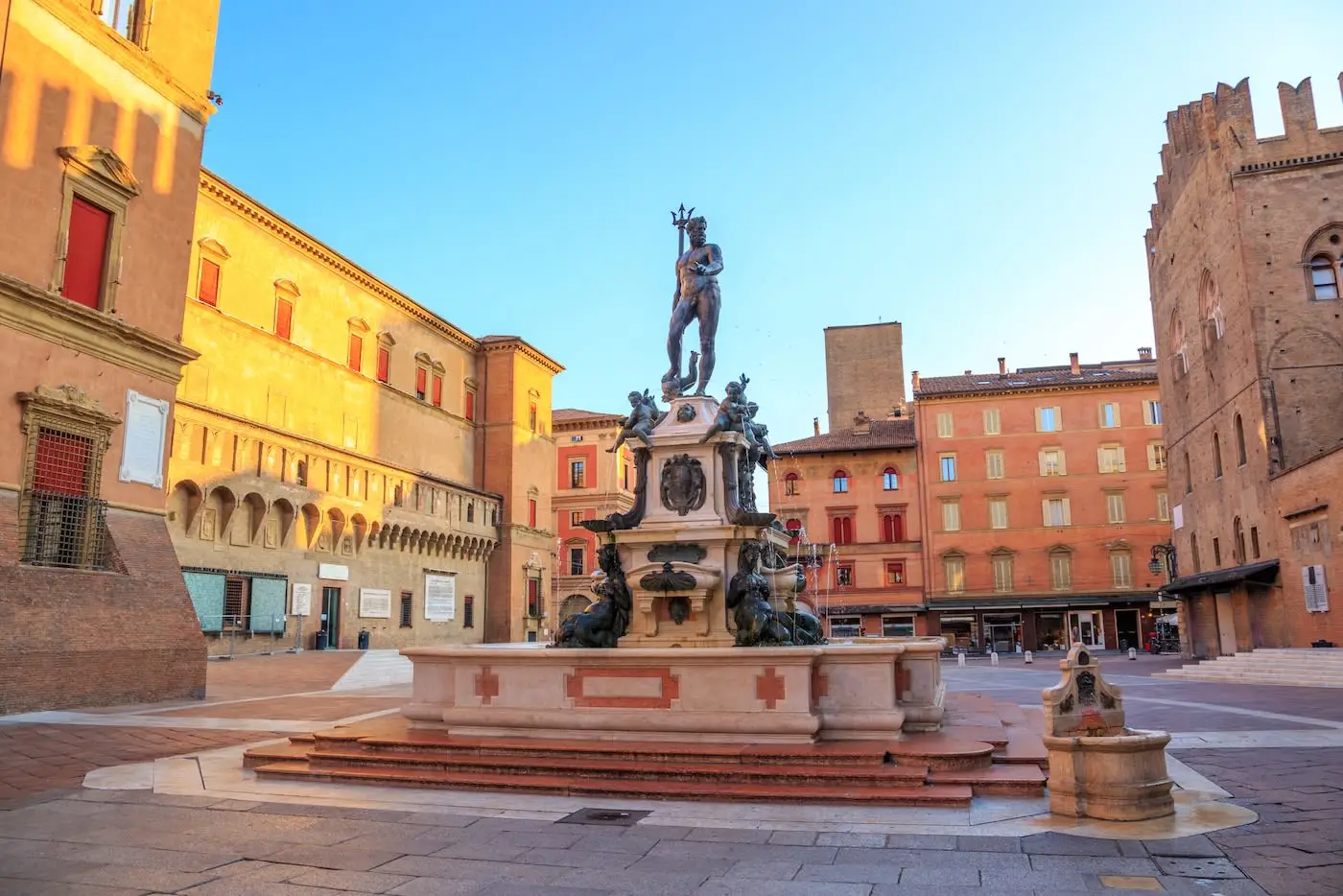 statue of neptune on square in bologna italy