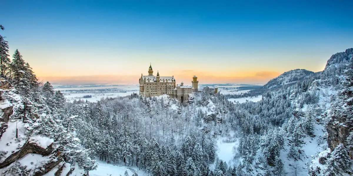 Neuschwanstein castle amidst the Bavarian mountains in winter