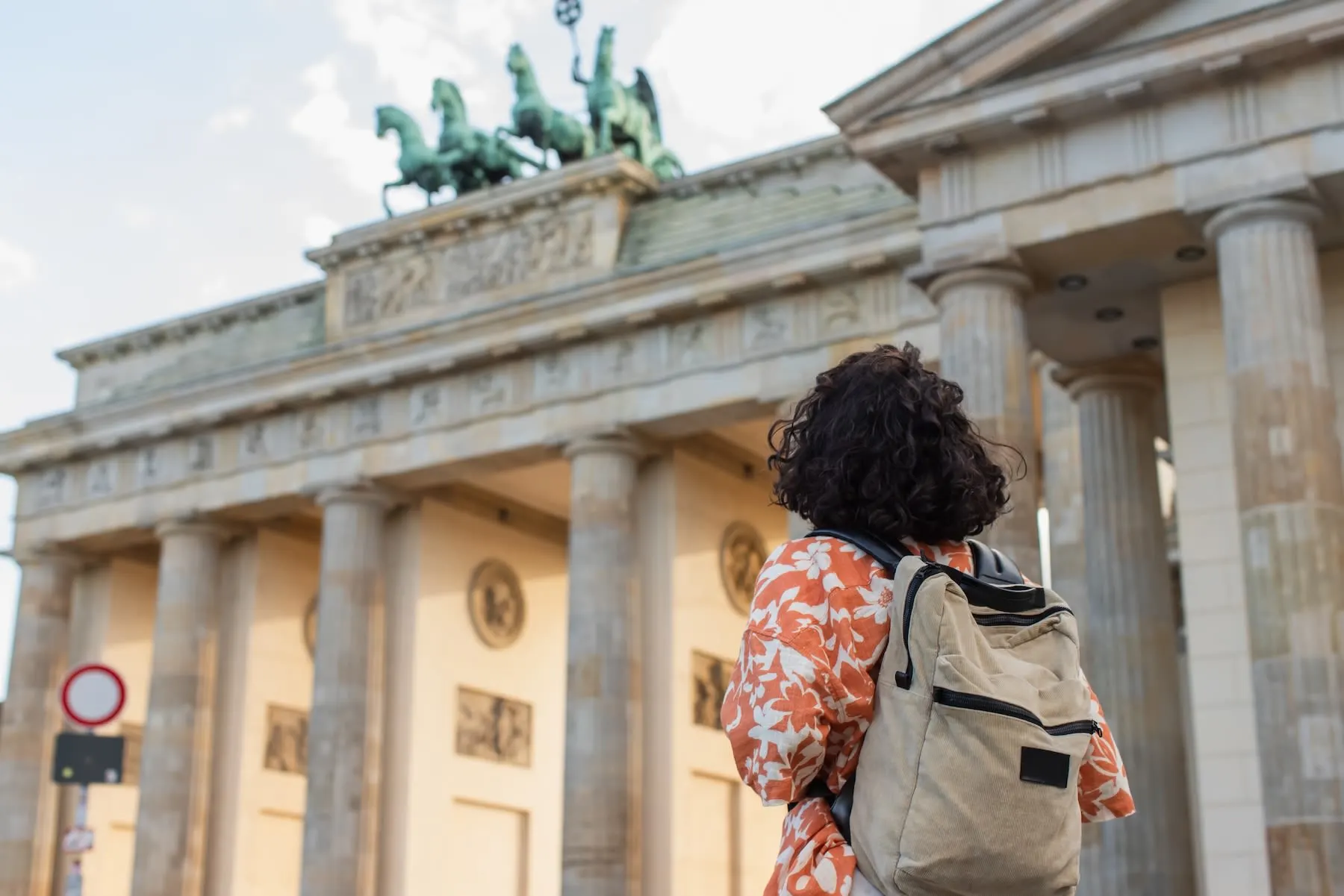 Tourist looking at the Brandenburg Gate