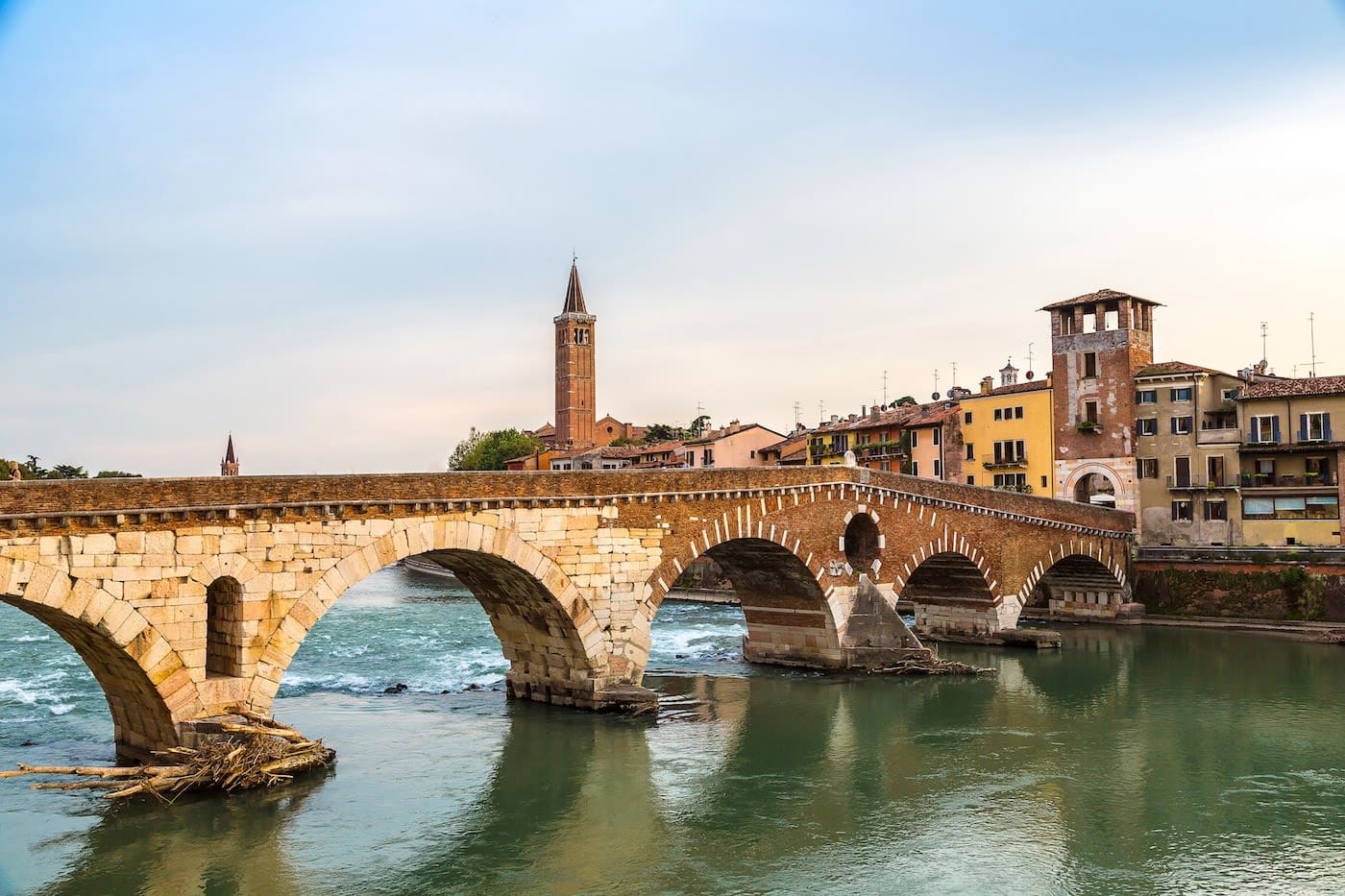 Ponte Pietra spanning river in verona italy