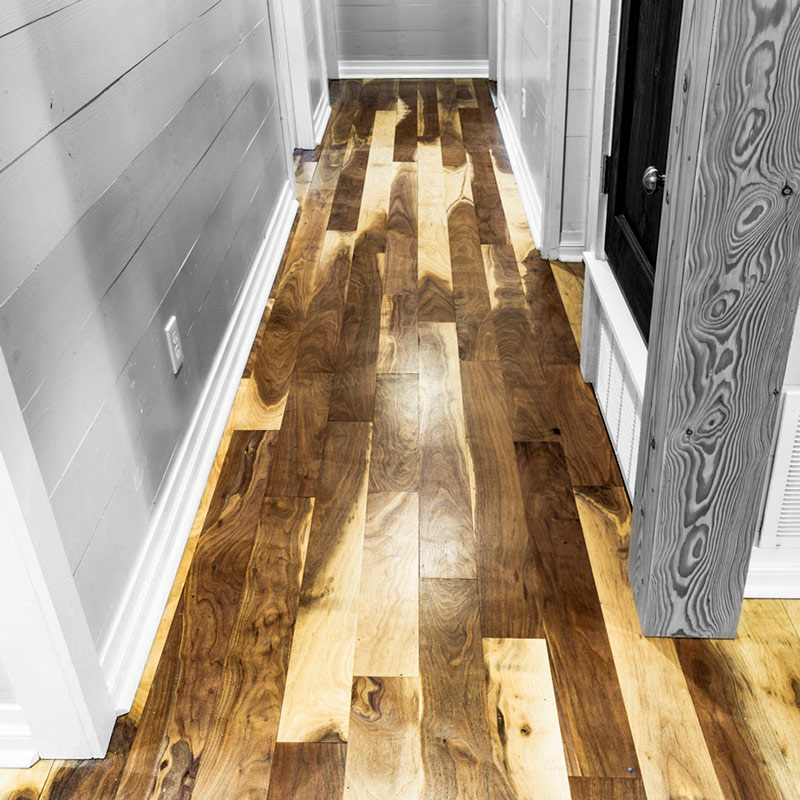 Sappy Walnut wood flooring in a hallway.