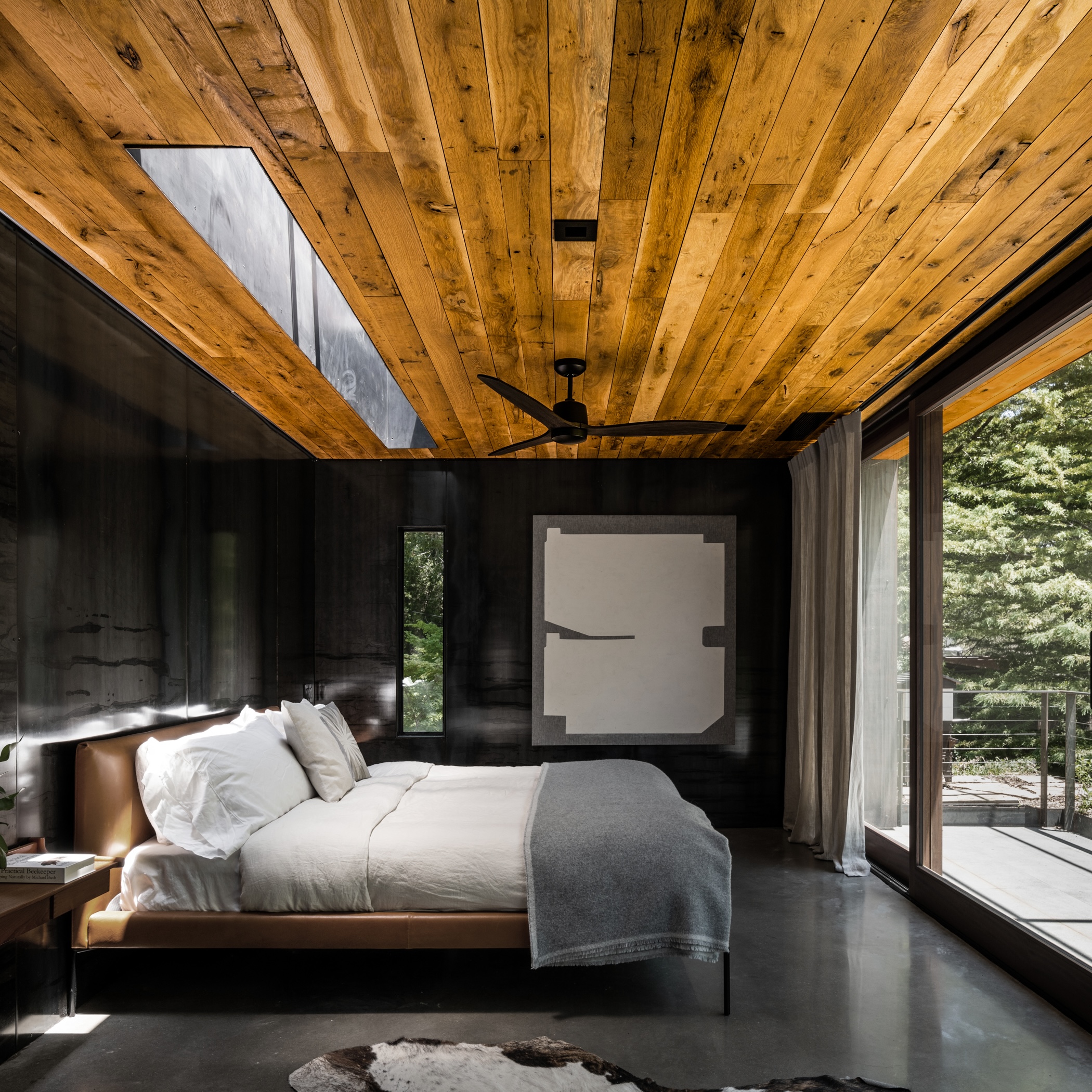 a house designed by wernfield architects with Texas Post Oak wall wood on the ceiling.