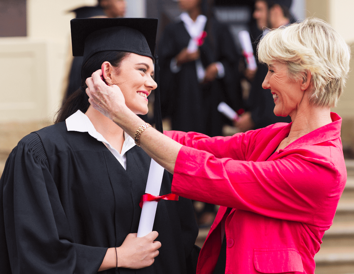 South Australian graduate in academic gown with mother