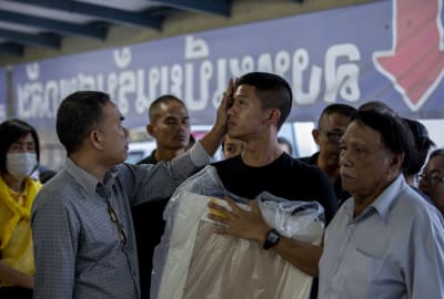 Families Of Thai Shooting Victims Wait For Answers Bodies